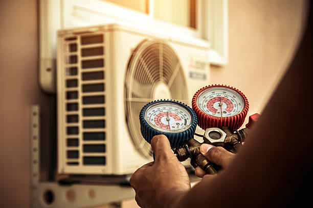 Professional Air Conditioning Service technician working in Kimmell, IN